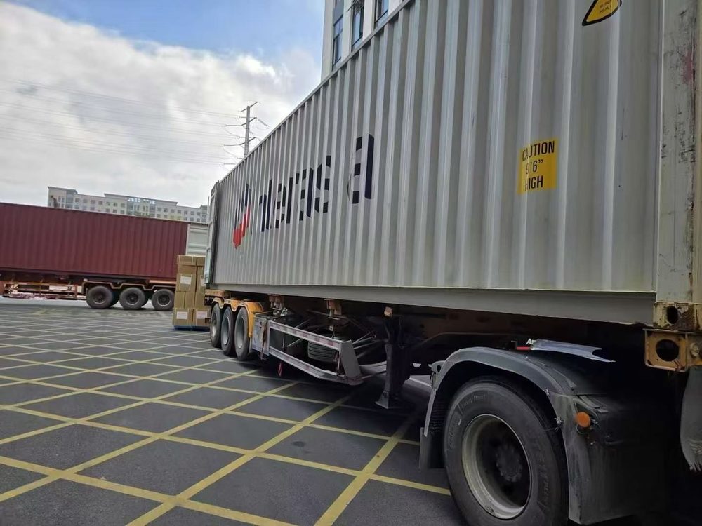 Container with pallets of cartons ready to load